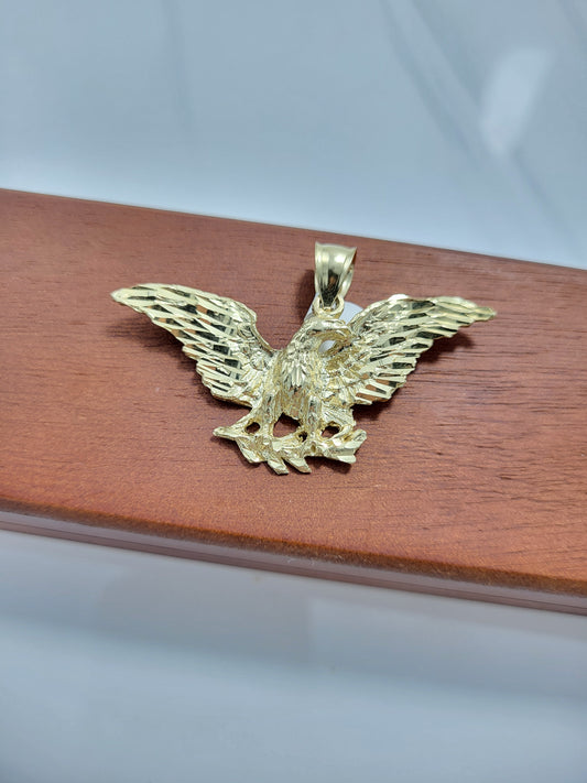 Dije de águila oro 10k
